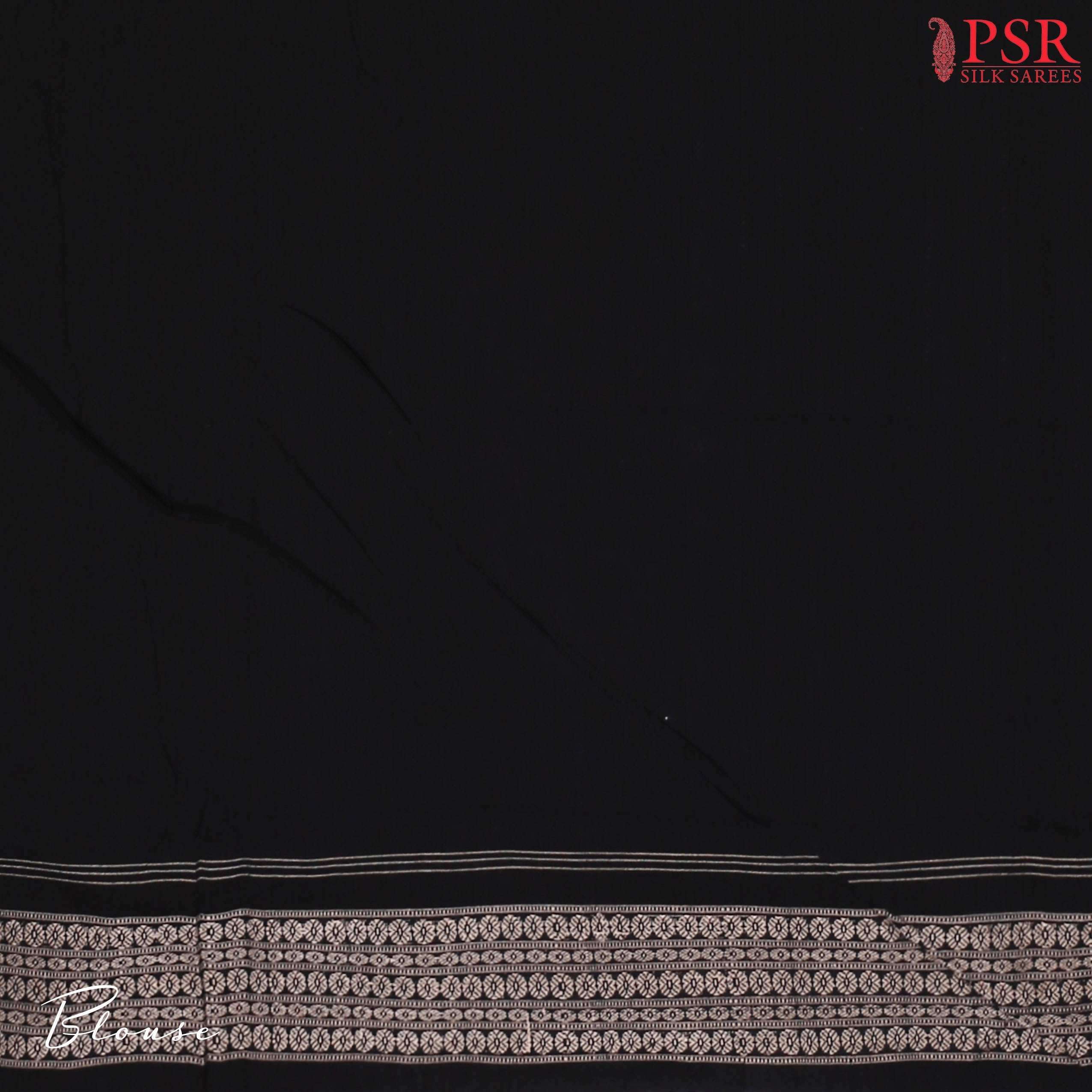 Plain Black blouse complementing the saree’s intricate detailing