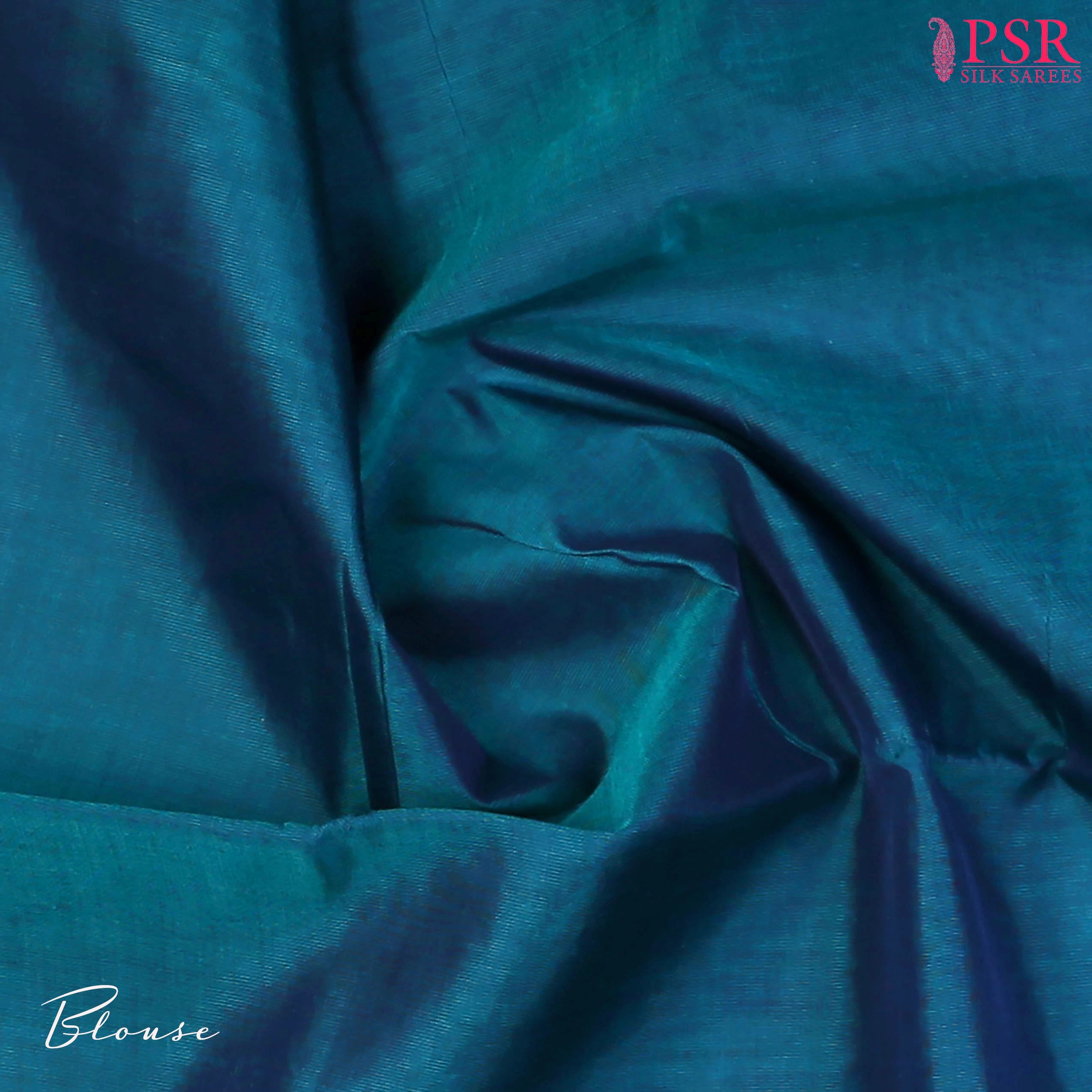 Dark Peacock Blue Cotton Silk Saree with a Maroon zari chit pallu, zari border, and plain Maroon blouse. A timeless and elegant traditional wear.