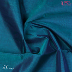 Dark Peacock Blue Cotton Silk Saree with a Maroon zari chit pallu, zari border, and plain Maroon blouse. A timeless and elegant traditional wear.