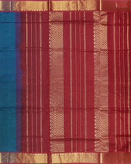 Dark Peacock Blue Cotton Silk Saree with a Maroon zari chit pallu, zari border, and plain Maroon blouse. A timeless and elegant traditional wear.