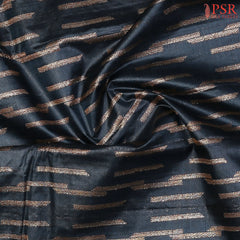 Delicate mixed zari weaving on lightweight tussar silk fabric.