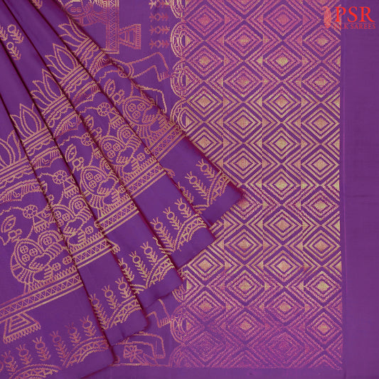 Drape yourself in tradition with our Dark Purple&nbsp;Soft Silk Saree, exquisitely woven with copper zari motifs that exude timeless charm. 