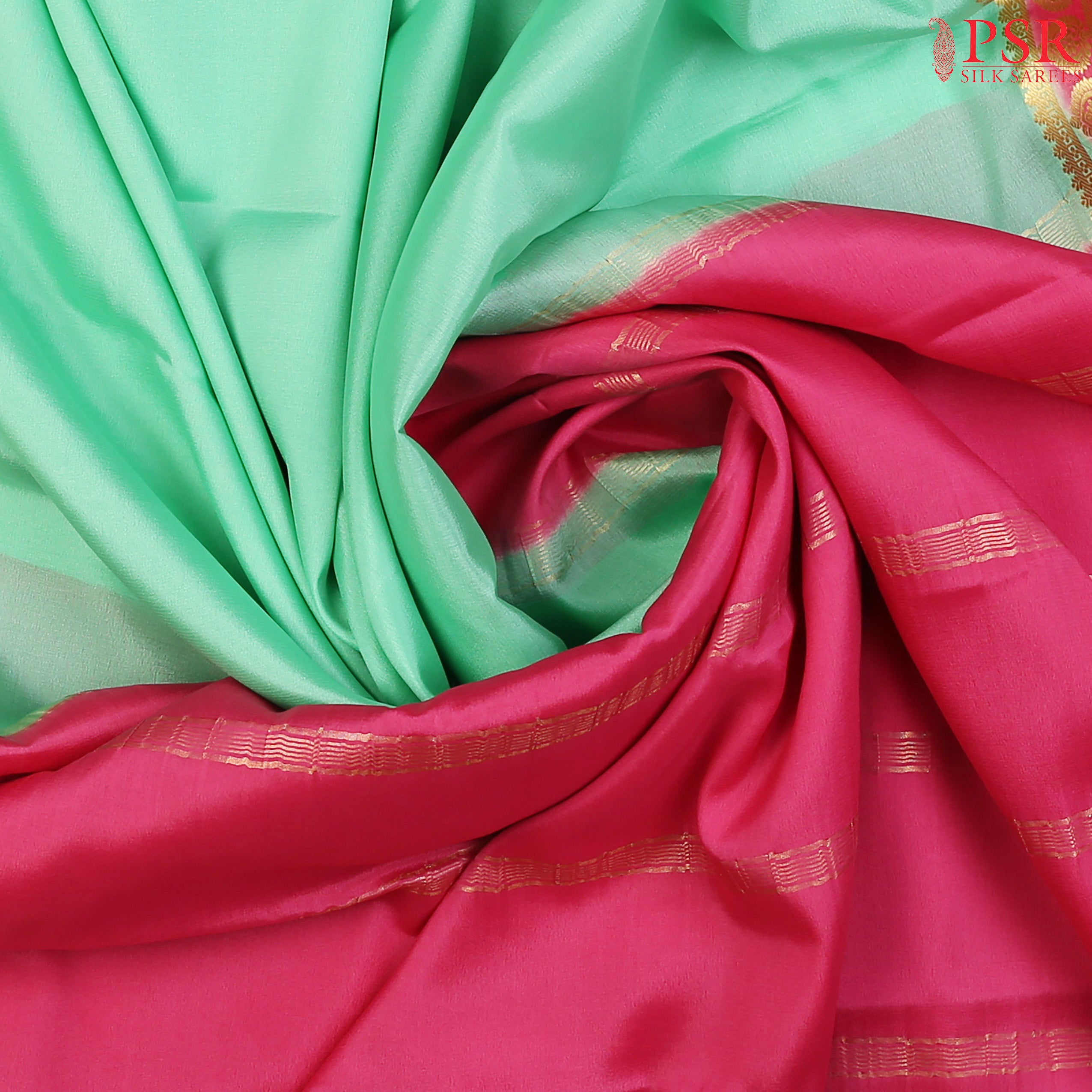 This De York Green &amp; Pink Mysore Silk Saree from PSR Silk Sarees is a graceful addition to your ethnic collection