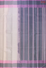 PSR Silks presents a Dove White colored Arani Silk saree with combination of Dark Grey color.