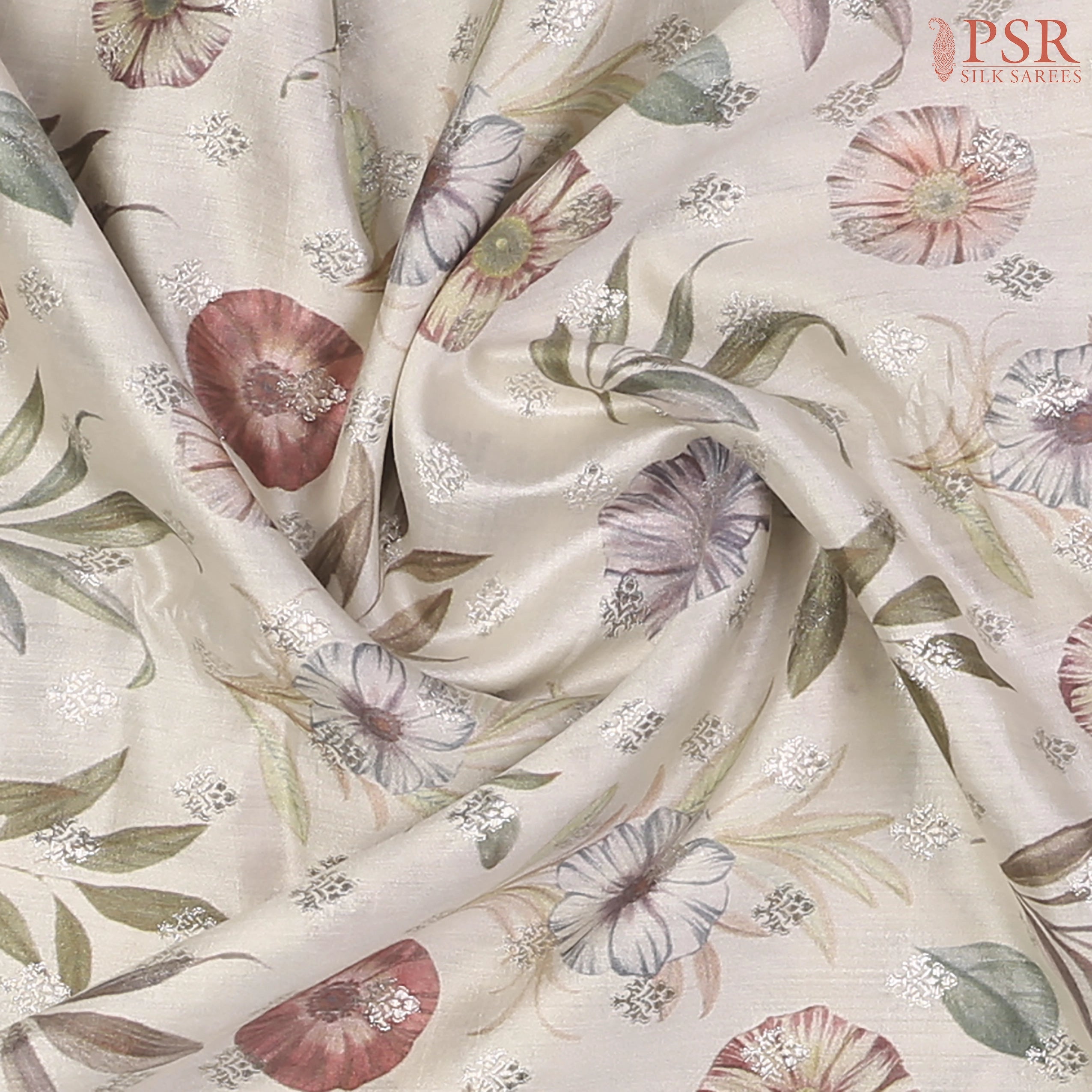Intricate silver zari floral detailing on soft Chiniya silk fabric