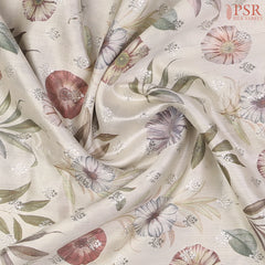 Intricate silver zari floral detailing on soft Chiniya silk fabric