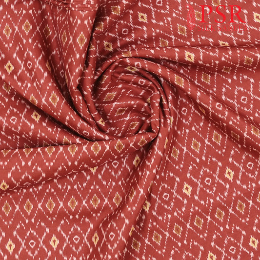 Brick Red Semi Tassar Ikkat Print Running Material