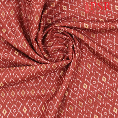 Brick Red Semi Tassar Ikkat Print Running Material