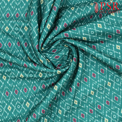 Pine Green Semi Tassar Ikkat Print Running Material