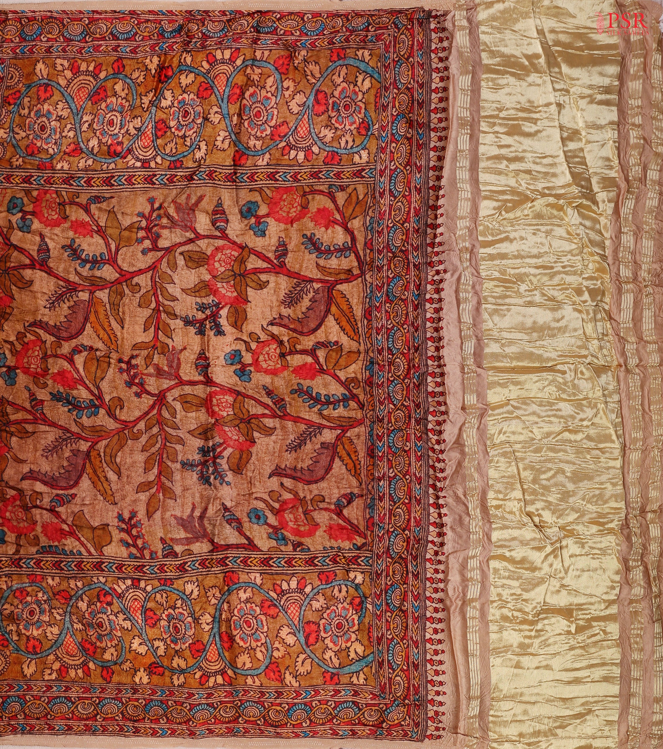 Golden tissue pallu featuring vibrant Kalamkari artwork.
