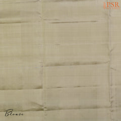 PSR Silk Sarees presents a graceful Light Blue and Light Green Soft Silk Saree, beautifully paired with a sophisticated Olive Grey accent. This saree stands out with its&nbsp;double-colored stripes, delicately woven with lustrous copper zari work, adding a touch of modern elegance.