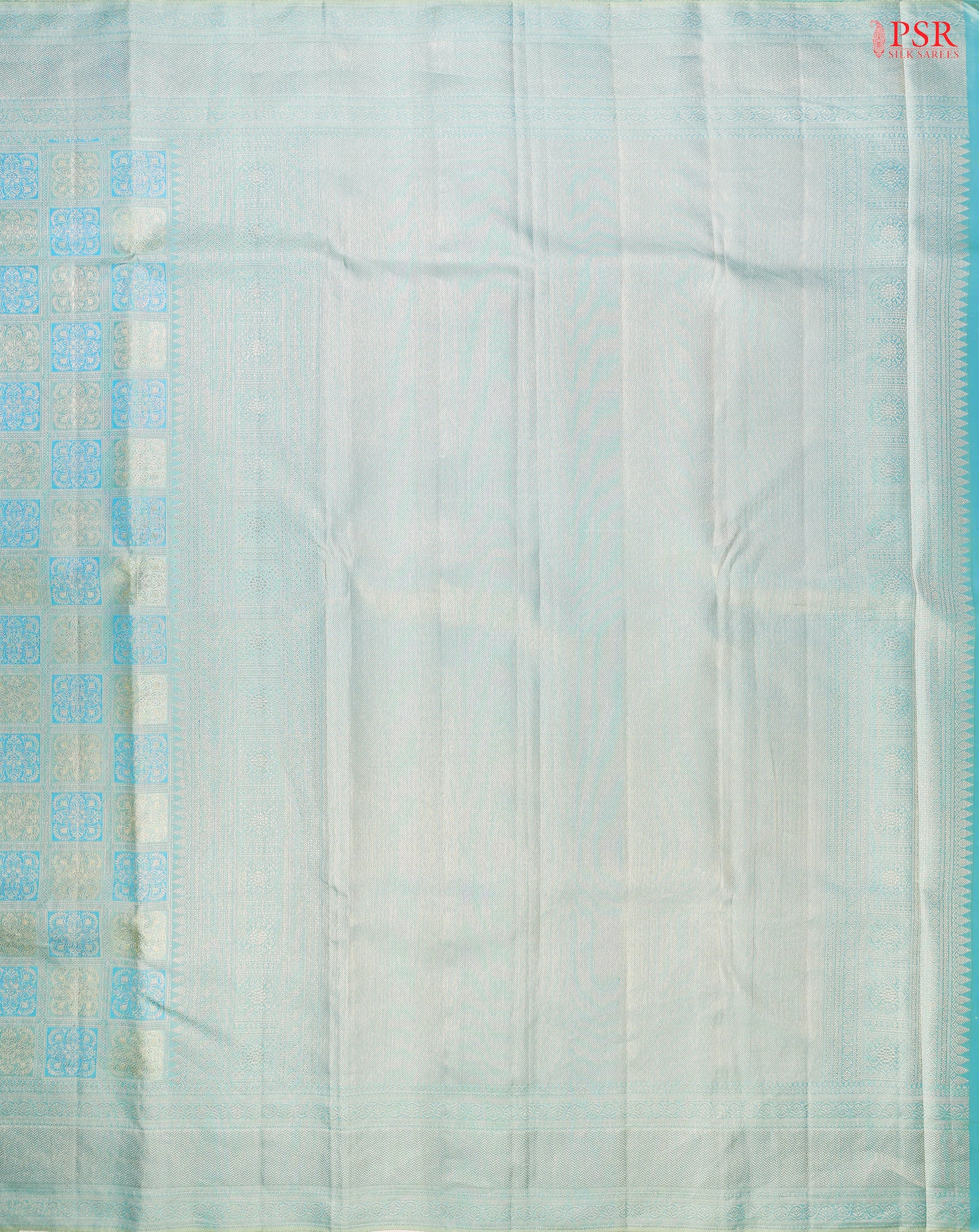 Light Turquoise Kanchipuram Silk Saree with checkered jacquard work, rich zari pallu, and blouse with Vazha Illai Stripes
