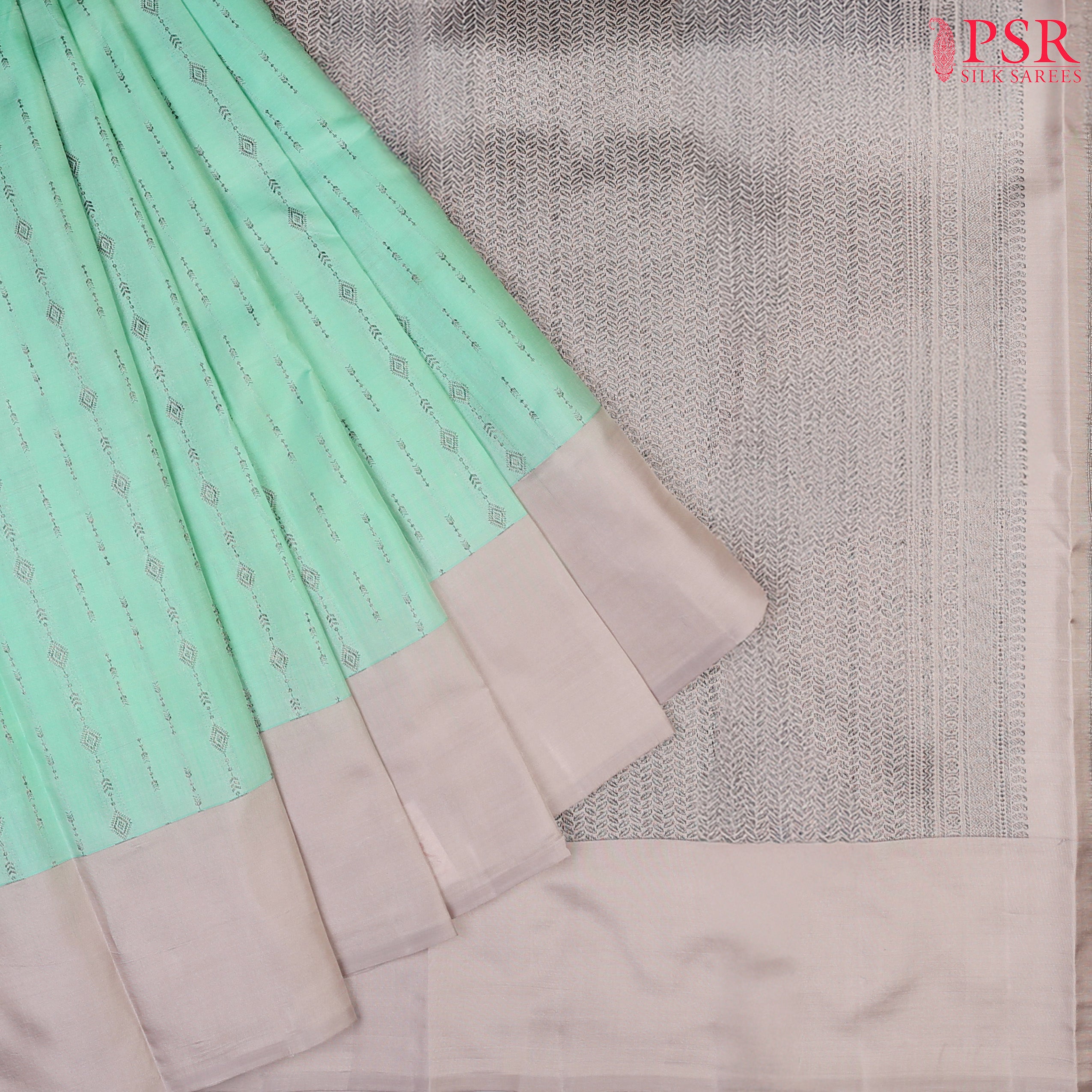 PSR Silks presents a Magic Mint colored Fancy Kanchipuram Silk saree with combination of Ecru Grey color.