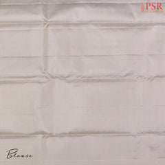 PSR Silks presents a Magic Mint colored Fancy Kanchipuram Silk saree with combination of Ecru Grey color.