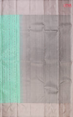 PSR Silks presents a Magic Mint colored Fancy Kanchipuram Silk saree with combination of Ecru Grey color.