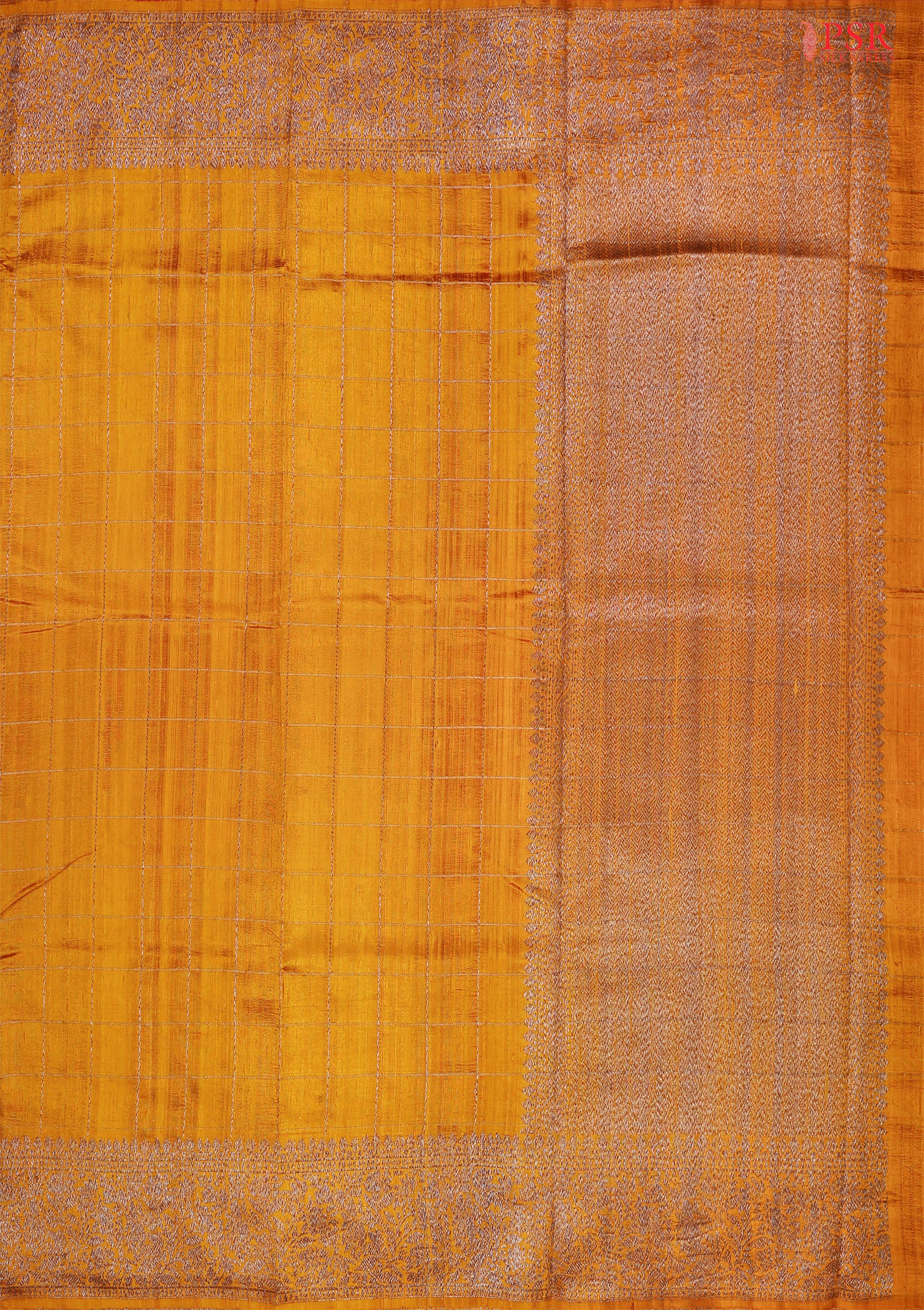 PSR Silks presents a stunning Marigold Banaras Jute Silk Saree, elegantly paired with a rich Jam Pink combination. 
