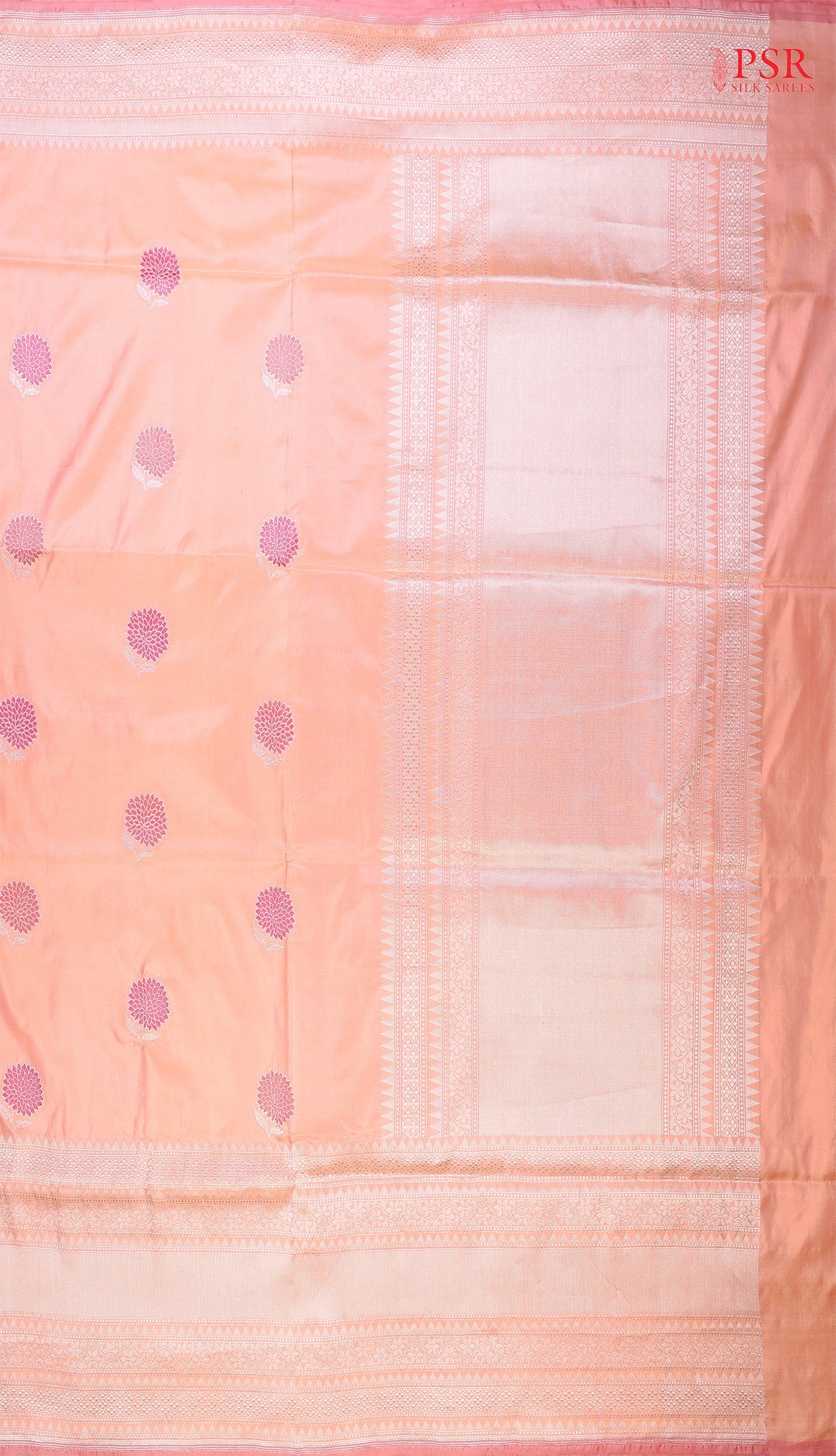 Discover the timeless charm of our Melon Peach Banarasi Katan Silk Saree, paired gracefully with a soothing Light Pink combination.