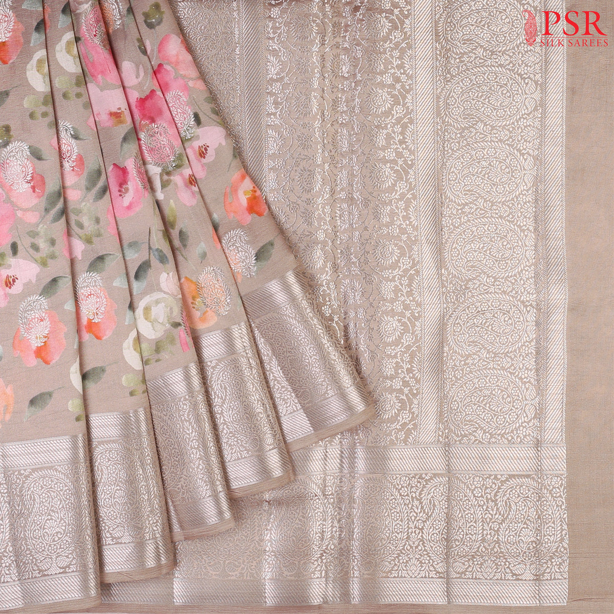 Mink Grey Chiniya Silk Saree with vibrant floral prints and silver zari paisley motifs.