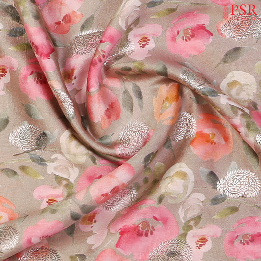 Detailed silver zari paisley motifs enhancing the floral design.