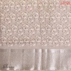 Floral printed Mink Grey blouse, complementing the saree’s elegance.