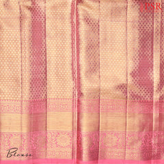 Designer Tissue Pink blouse with elegant zari work for a sophisticated touch
