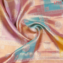 Intricate floral zari detailing with vibrant Blue, Yellow, Peach, and Purple weaves