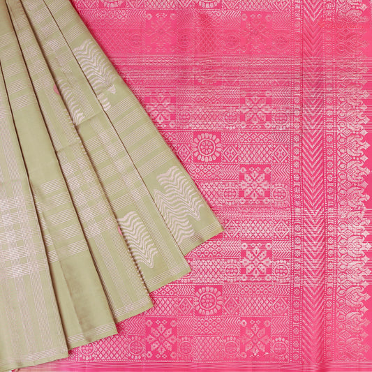 Drape yourself in contemporary grace with our Olive Mist Soft Silk Saree, beautifully contrasted with a vibrant Pink hue.