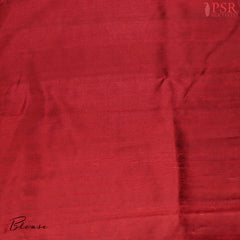 Unveil a world of elegance with this stunning Peacock Blue Banaras Jute Silk Saree, beautifully paired with a vibrant Red accent. 