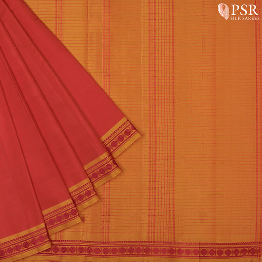 PSR Silks presents a Red colored Arani Silk saree with combination of Dark Orange color.