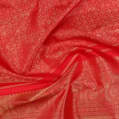 Red Kanchipuram Bridal Silk Saree with Golden Zari Jacquard Checks, Chakra & Floral Motifs, Rich Zari Pallu & Border – PSR Silks