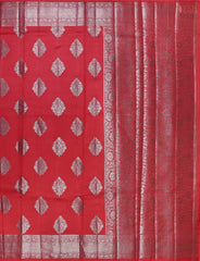 Red Chiniya Silk Saree, a timeless masterpiece adorned with silver zari floral brocade motifs. 