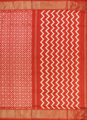PSR Silks brings you a breathtaking Red &amp; Cream Yellow Pochampally Ikkat Silk Saree. 