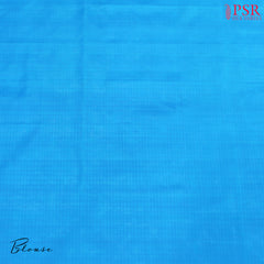 Experience elegance and grace with the exquisite White and Cerulean Blue Coimbatore Soft Silk Saree by PSR Silks. 