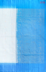 Experience elegance and grace with the exquisite White and Cerulean Blue Coimbatore Soft Silk Saree by PSR Silks. 