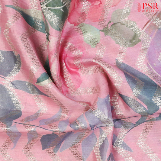 Intricate silver zari chevron detailing on soft Chiniya silk fabric