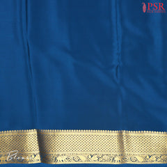 PSR Silks presents a Taffy Pink colored Mysore Silk saree with combination of Peacock Blue color.