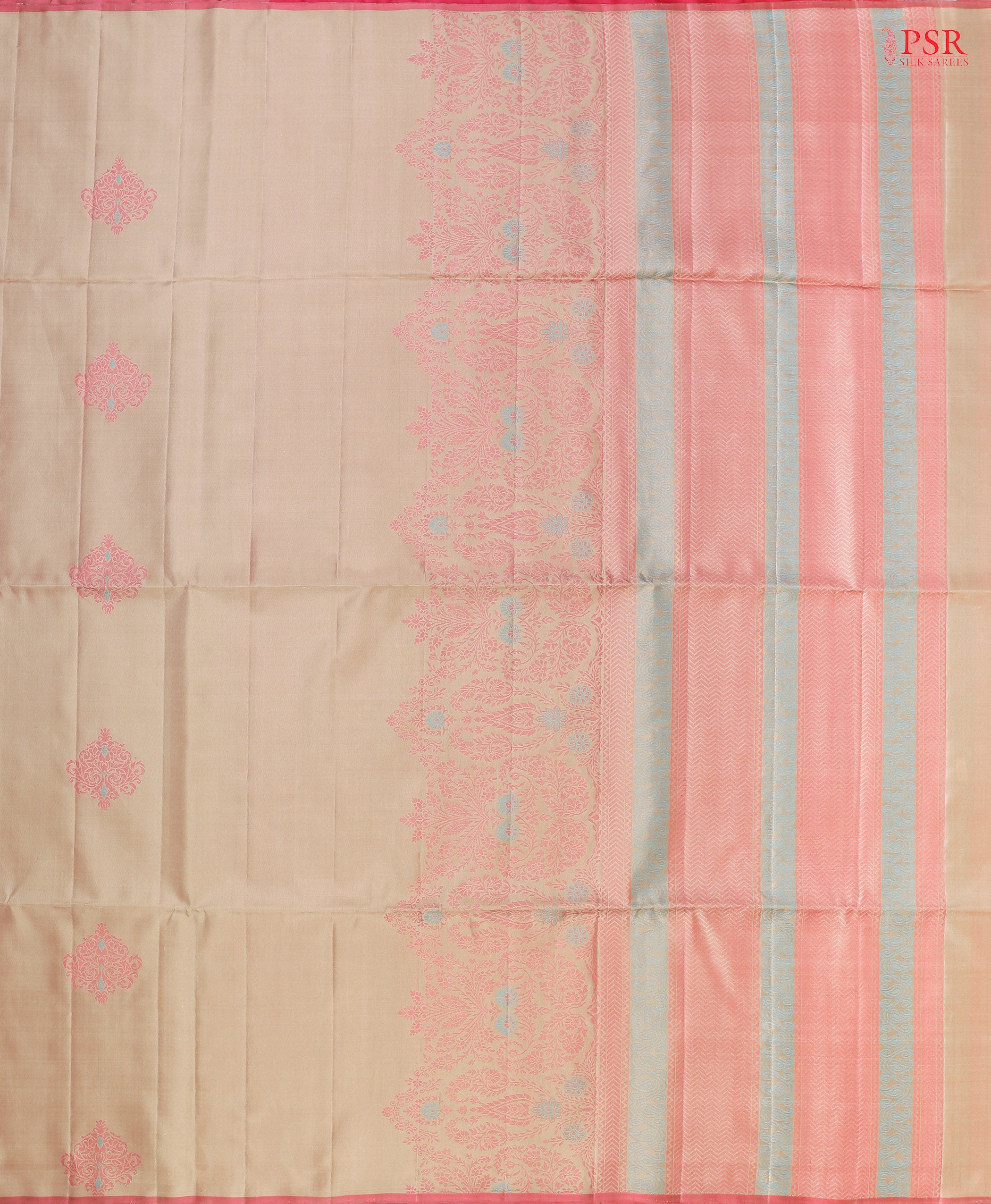 This exquisite Soft Silk saree in a soft Tussar Beige hue is beautifully contrasted with vibrant Punch Pink accents. Featuring intricate floral thread motifs woven into the fabric, this saree is a celebration of artistry and craftsmanship.