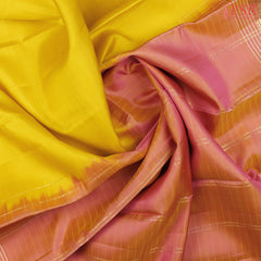 PSR Silks presents a Yellow colored Arani Silk saree with combination of Coral Pink color.