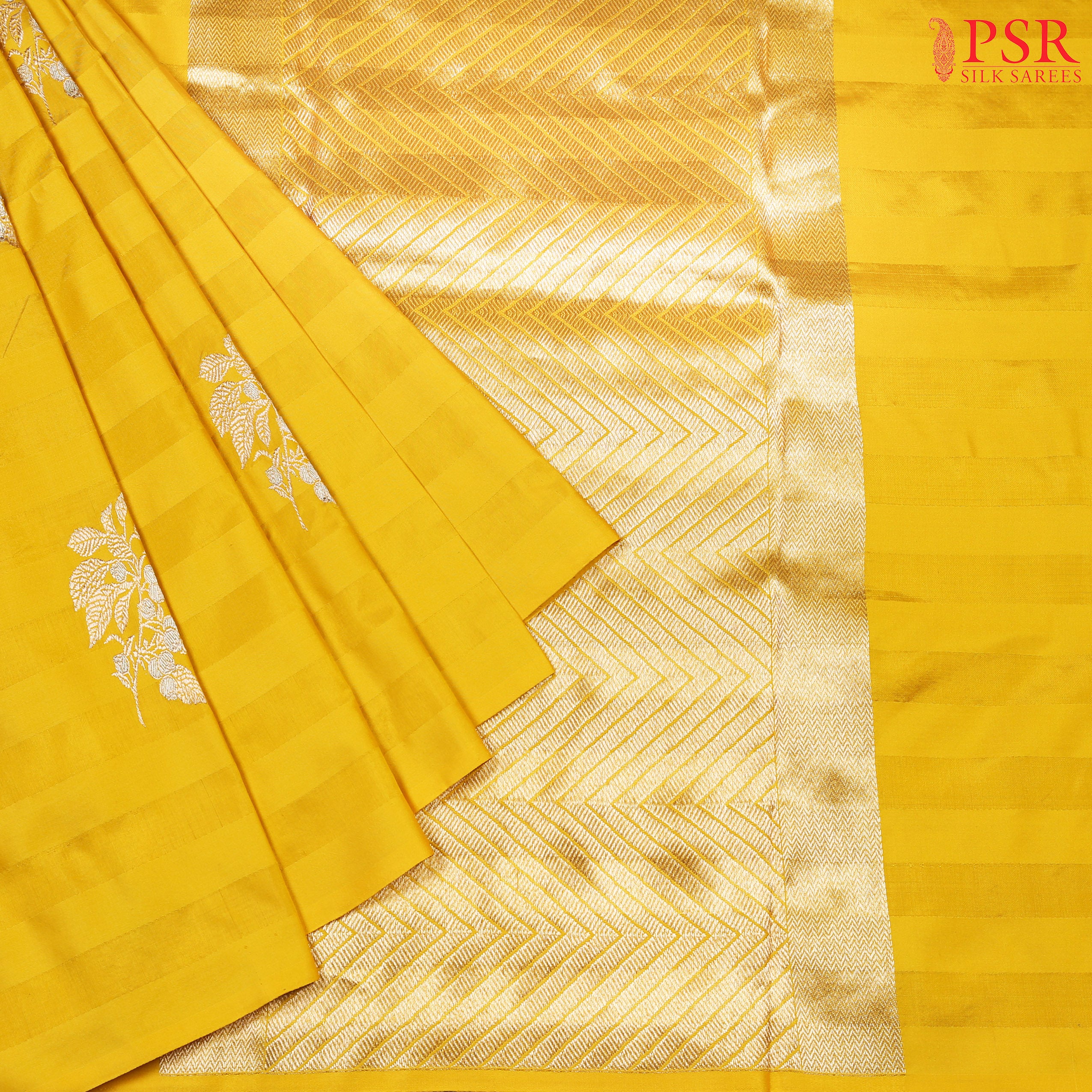Unveil the magic of elegance with our Yellow Banarasi Silk Saree from PSR Silks. 