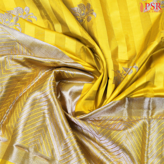 Unveil the magic of elegance with our Yellow Banarasi Silk Saree from PSR Silks. 