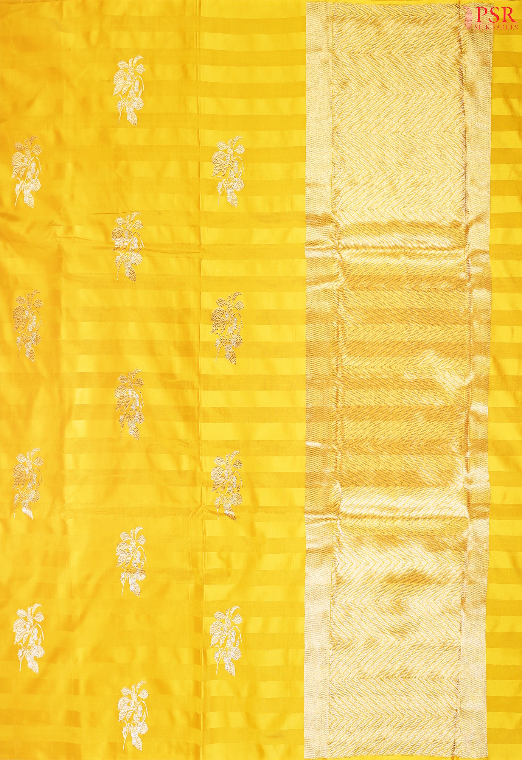 Unveil the magic of elegance with our Yellow Banarasi Silk Saree from PSR Silks. 