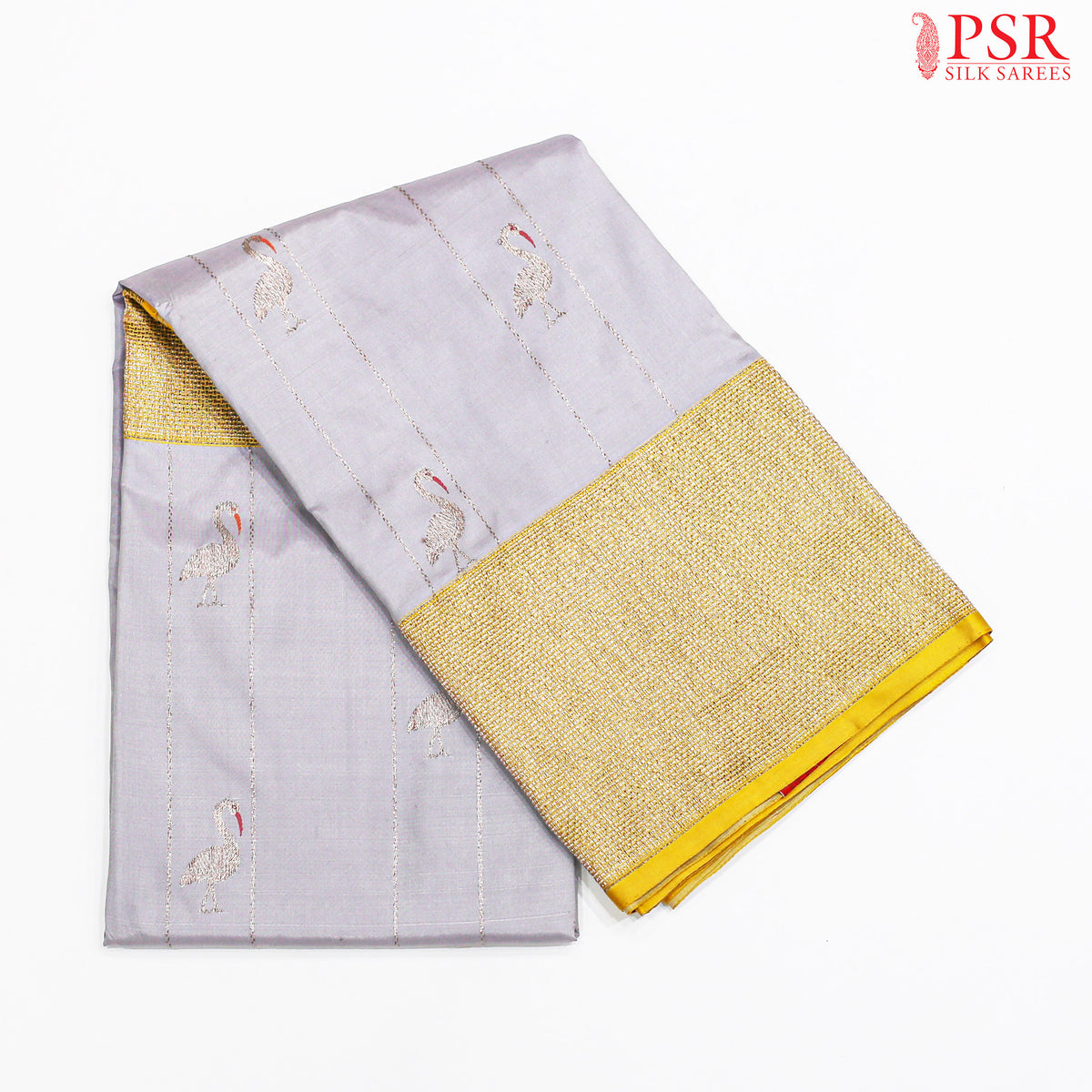 PSR Silks Presents Lavender Grey Colored Pure Banaras Silk Saree With a Combination of Yellow Colors. Saree Has Soft Neem Zari Strips With Flamingo Motifs.