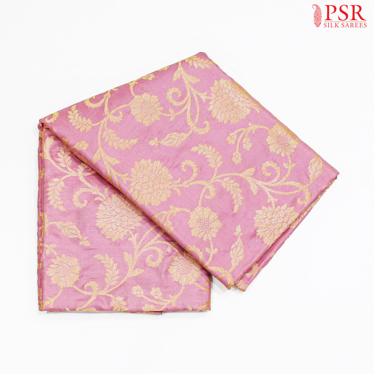 PSR Silks Presents Pastel Taffy Pink Colored Banaras Silk Saree With Beautiful Neem Zari Work. The Scroll Floral Brocade Pattern And Rich Zari Work In Pallu Gives This Saree An Adorable Look.